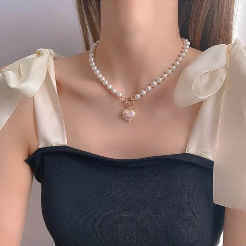 Heart Shaped Pearl Necklace 💖🦋Elevate your style with our Heart-Shaped Pearl Necklace - a symbol of love and sophistication that adds a touch of elegance to your look. 💖🦋🌟
Key Features:
💖 ExqSHOP ALL I WANTShop All I WantHeart Shaped Pearl Necklace