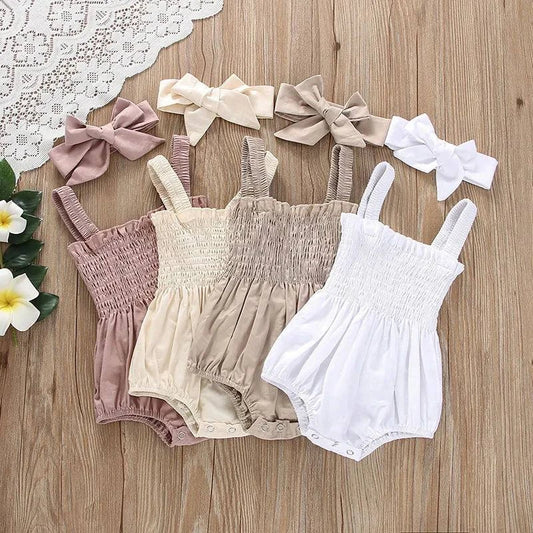 Baby Summer Jumpsuit – Solid Color, Ruched Romper with Sleeveless SuspOutfit your little one in adorable style with this Baby Summer Jumpsuit. The solid color, ruched romper comes with a sleeveless suspender design and a matching headbShop All I WantShop All I WantBaby Summer Jumpsuit