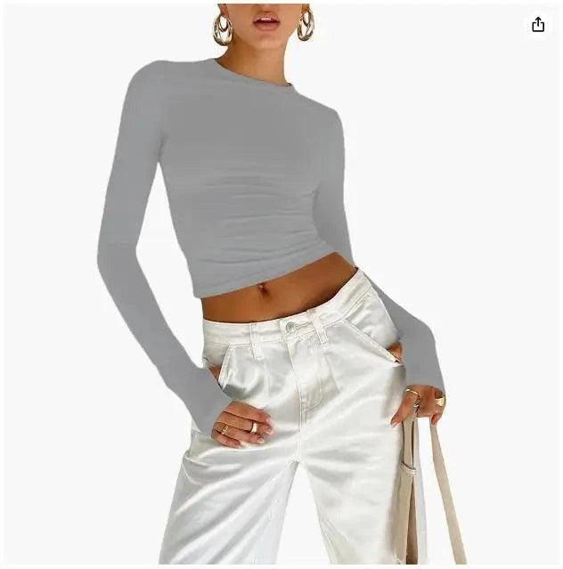 Slim Fit Long Sleeve Crop TopElevate your casual look with the Chic Long Sleeve Crew Neck Crop Top. Designed for the modern woman, this slim-fit tee features a trendy crew neck and convenient thSHOP ALL I WANTShop All I WantSlim Fit Long Sleeve Crop Top