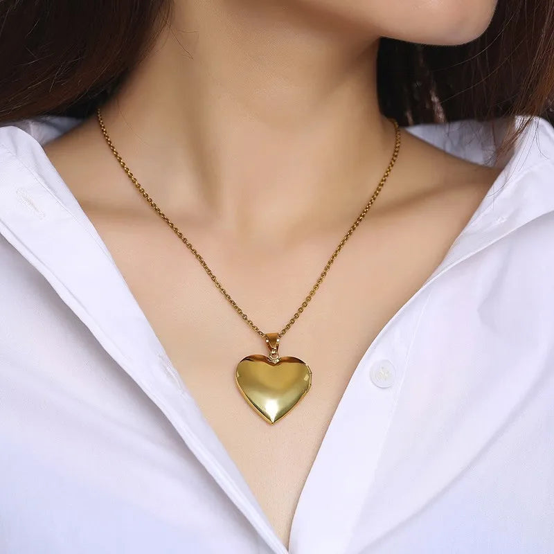 Heart Locket Pendant 💖📸 #FamilyLoveNecklaceCapture the essence of family love with our Heart Locket Pendant – a timeless piece that holds cherished memories close to your heart. This elegant necklace, adornedSHOP ALL I WANTShop All I WantHeart Locket Pendant