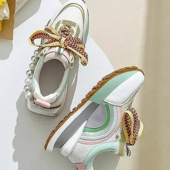 Lace-Up Pearl Chain Platform Sneakers 👟✨ #WomenShoesIntroducing our Lace-Up Pearl Chain Platform Sneakers – a fusion of style and comfort that redefines casual chic in the world of #WomenShoes. Elevate your footwear cSHOP ALL I WANTShop All I WantPearl Chain Platform Sneakers 