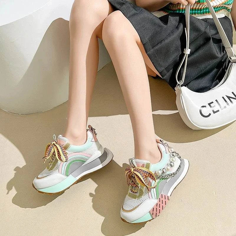 Lace-Up Pearl Chain Platform Sneakers 👟✨ #WomenShoesIntroducing our Lace-Up Pearl Chain Platform Sneakers – a fusion of style and comfort that redefines casual chic in the world of #WomenShoes. Elevate your footwear cSHOP ALL I WANTShop All I WantPearl Chain Platform Sneakers 