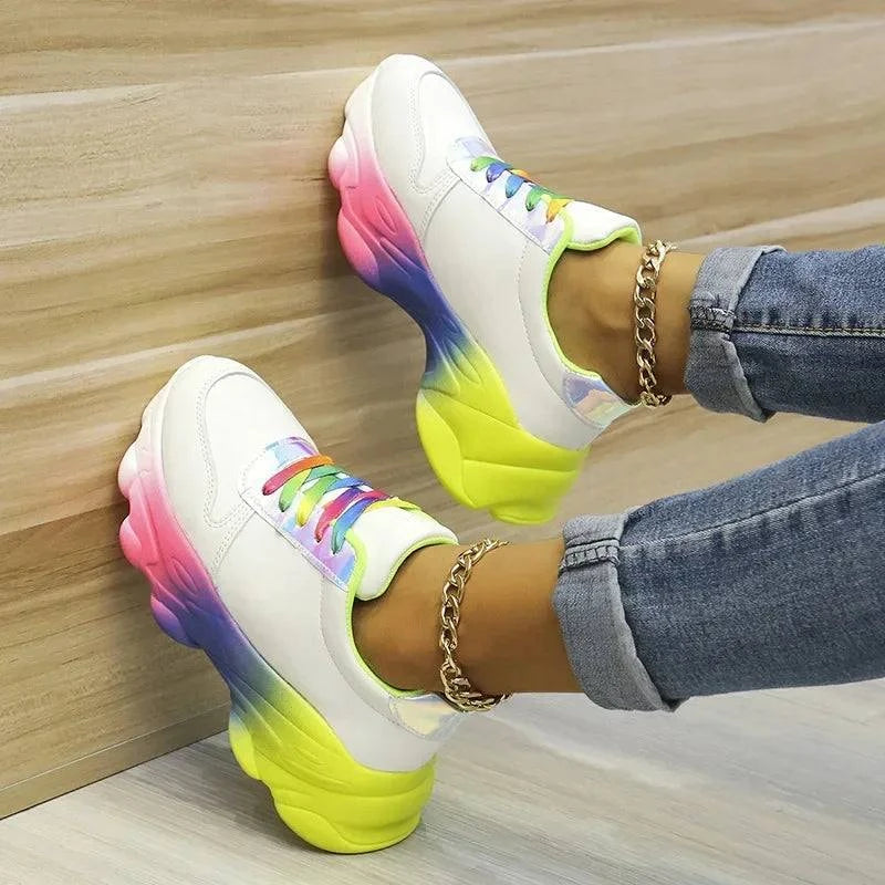 Trendy Rainbow SneakersStep into the vibrant world of fashion with our Trendy Rainbow Sneakers – a playful and stylish addition to your footwear collection. These sneakers are designed to Shop All I WantShop All I WantTrendy Rainbow Sneakers