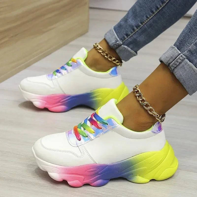 Trendy Rainbow SneakersStep into the vibrant world of fashion with our Trendy Rainbow Sneakers – a playful and stylish addition to your footwear collection. These sneakers are designed to Shop All I WantShop All I WantTrendy Rainbow Sneakers