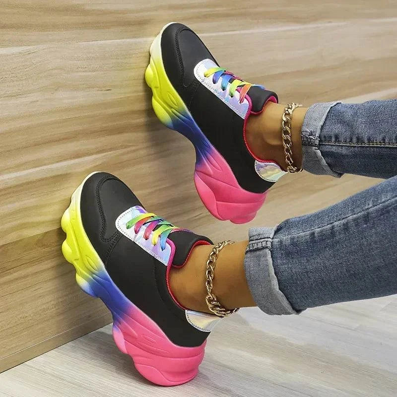 Trendy Rainbow SneakersStep into the vibrant world of fashion with our Trendy Rainbow Sneakers – a playful and stylish addition to your footwear collection. These sneakers are designed to Shop All I WantShop All I WantTrendy Rainbow Sneakers